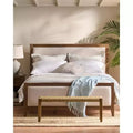 Acacia wood upholstered bed