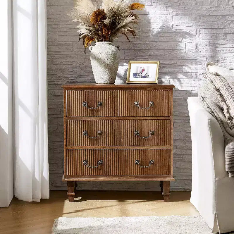 Nightstand with a pull-out tray featuring a built-in charging station