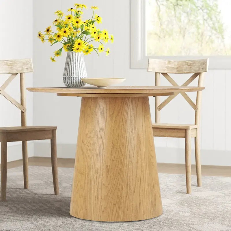 Round pedestal dining table